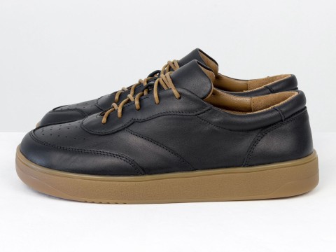 Женские анатомичные  кеды из натуральной кожи черного цвета с перфорацией Gino Figini